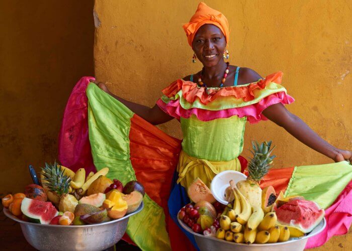 Palenquera selling fruits in Cartagena